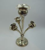 An Edwardian silver epergne having a central tulip vase within a trio of smaller similar tulip vases
