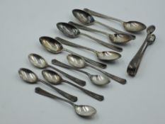 Two loose sets of HM silver coffee spoons, one having matching sugar nips, approx 142g