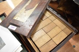 A pine painted box containing vintage Oak Building Blocks supplied by Burt & Son