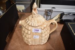 A mid-century Sadler type 'Yee Daintee Lady' teapot, in buff