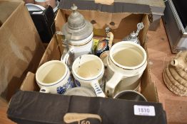 A selection of ceramic beer steins and tankerds