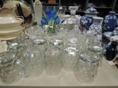 A selection of glass wares including art glass plate and beer mugs
