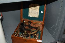 An early 20th century J.H Stewart lacquered brass sextant, the mahogany case with National Physics