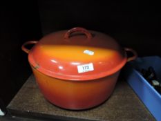 A vintage cast lidded caserole dish