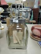 A vintage Blow Butter churn.