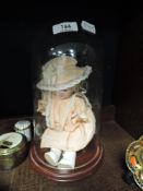 A German Armand Marseille 390 doll of small proportions, with dome.