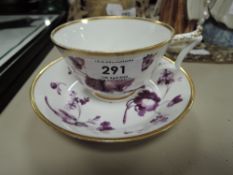 A 19th century Worcester flight Barr and Barr tea cup and saucer having white ground with purple