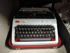 A retro 'Daro Erika' typewriter, with hard case