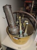 An assortment of metal ware including brass jam pan.
