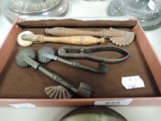 A selection of vintage bakers pastry jiggers or crimpers