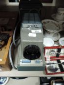 A mid century 'Hi-Lyte' projector and original case