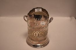 A Mappin & Webb 'Princes Plate' bottle stand, with pierced repeating designs, marks to base, minor