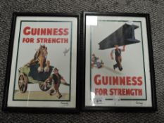 Two framed Guinness prints.
