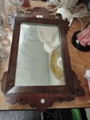 A vintage mahogany framed Chippendale styled mirror