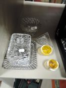 A selection of clear cut crystal glass wares and similar art glass bowls bearing signature