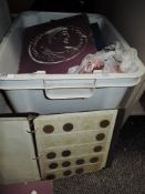 A box of collectable coins,some in albums.