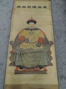 An early 20th century Chinese scroll print with heightened detail bearing seal mark and signature