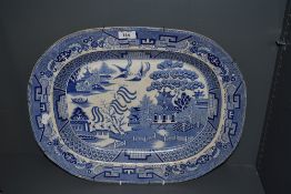 A 19th century W.C & Co Willow pattern ashette, transfer printed in blue and white