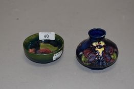 A duo of Moorcroft, circa 1960s/70s including Hibiscus pin dish having green ground and Aquilegia