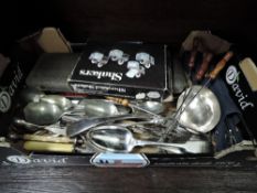 A selection of cutlery and flatwares including carver set