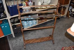 A late 19th century turned beech towel rail, of traditional design