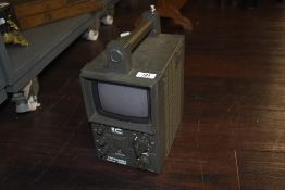 A vintage 'National Commando SOS' portable transistor television