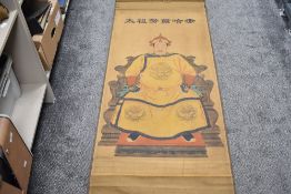 An early 20th century Japanese scroll print with heightened detail bearing seal mark and signature