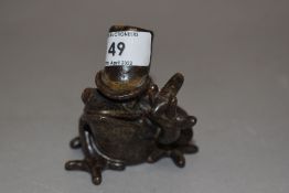 A Hawkshead pottery frog sporting Jaunty top hat and Cigar.