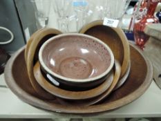 A set of vintage style teak wooden salad or similar bowls