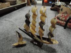 Two vintage horn carved model boats or galleons