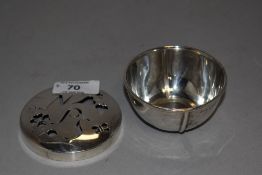 A Guernsey HM silver bowl and a HM silver lid having cut work NPS monogram and clover.