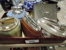 A selection of cigarette lighters and a pewter horse race themed cigarette case