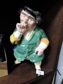 A Toby style figure vase in a Staffordshire style