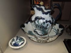 A Victorian style toilet jug & bowl, with foliate decoration embellished in gilt, with matching