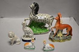 A collection of Staffordshire figures etc,including dogs, deer and more.