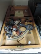 A Heath & Co 'The Hezzanith' lacquered brass sextant, oak cased with carry handle.
