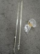 Two cylindrical clear glass towel rails with chromed metal fixings