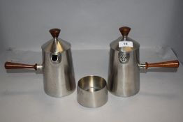 Two 1960's/70's Old Hall stainless steel chocolate pots and sugar bowl