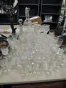 A selection of antique and later clear cut crystal glass wares including etched wine ewer