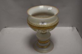 An Edwardian urn form frosted glass centre piece having extensive gilt detailing.