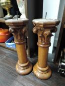 A pair of substantial golden oak pricket candlesticks, of Ecclesiastical design 49cm high