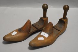 A pair of 19th century hinged beech shoe lasts.