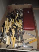 A good collection of cutlery and table wares including butter knives