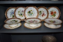A small quantity of 19th century English porcelain dessert wares, decorated with botanical studies