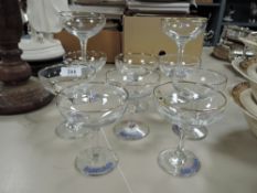 Ten Babycham glasses including white Fawn examples.