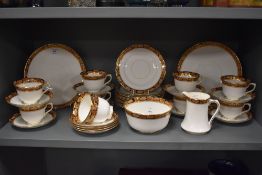 A selection of early 20th century Royal Albert having white ground with floral motifs in the Imari