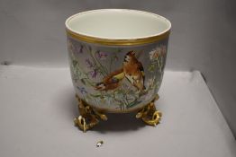 A highly decorative early 20th century Limoges planter having extensive gilt detailing with