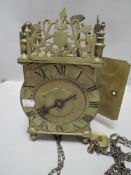 A part 17th century brass, steel and iron 'hook and spike' lantern clock , with finial topped