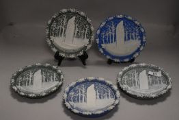 A group of five Jasper ware style souvenir roundals, sprigged with 'The Ruskin Memorial, Keswick'