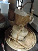A selection of woven fibre and wicker baskets and trays